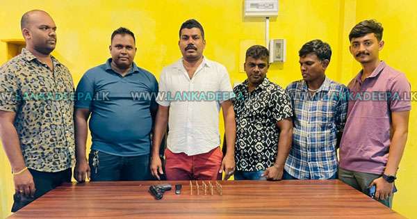 පාතාලයෙක් ගිනි අවි උණ්ඩ සමඟ අල්ලයි