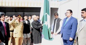 H.E. Shakeel Hussain hoisting the flag